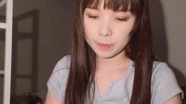 Cute Japanese teen sucking plastic dildo